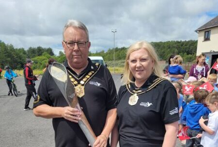 Chairman of council receives Queen’s Baton at Pembrey