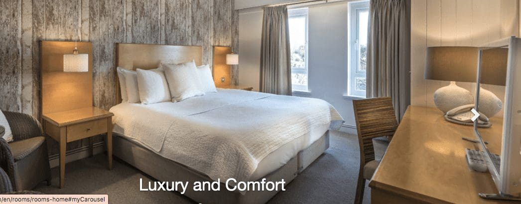 Hotel owners enrage protesters by  filling skips with four star furniture