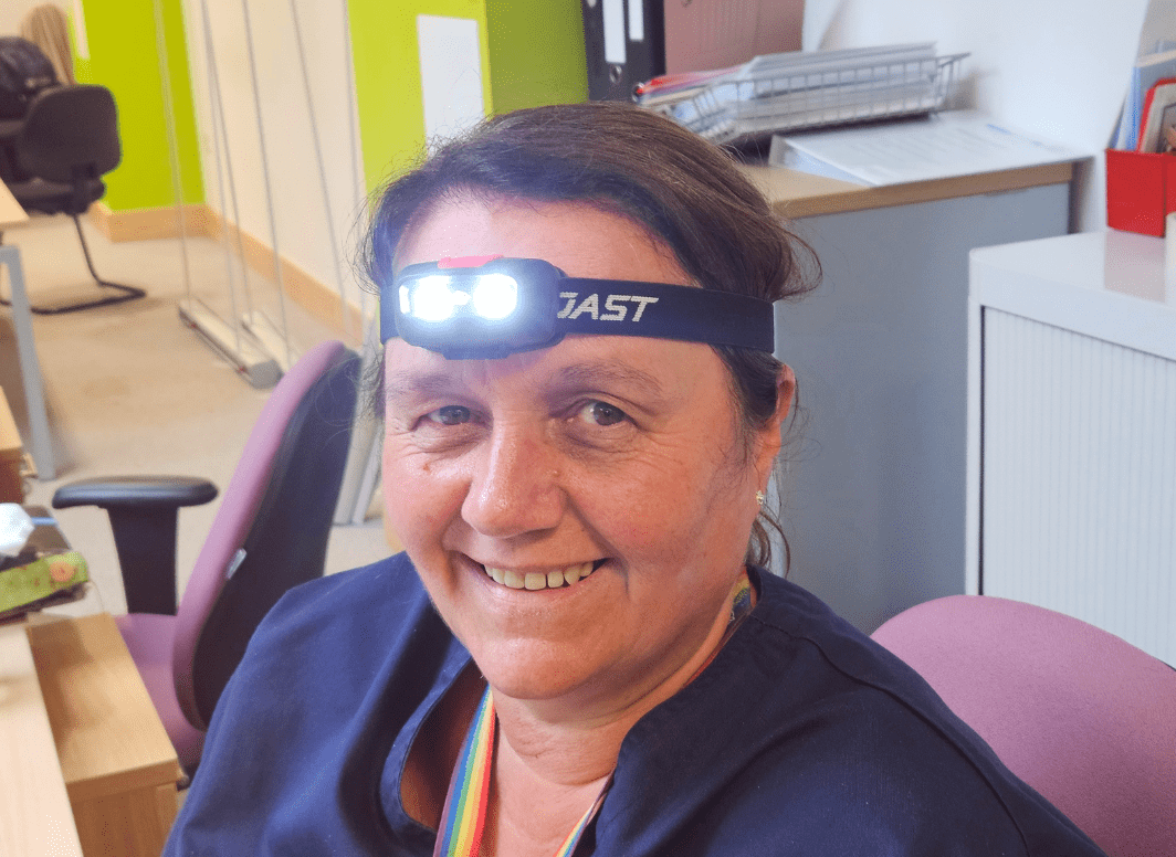 Donations help purchase head torches for community nurses across Carmarthenshire