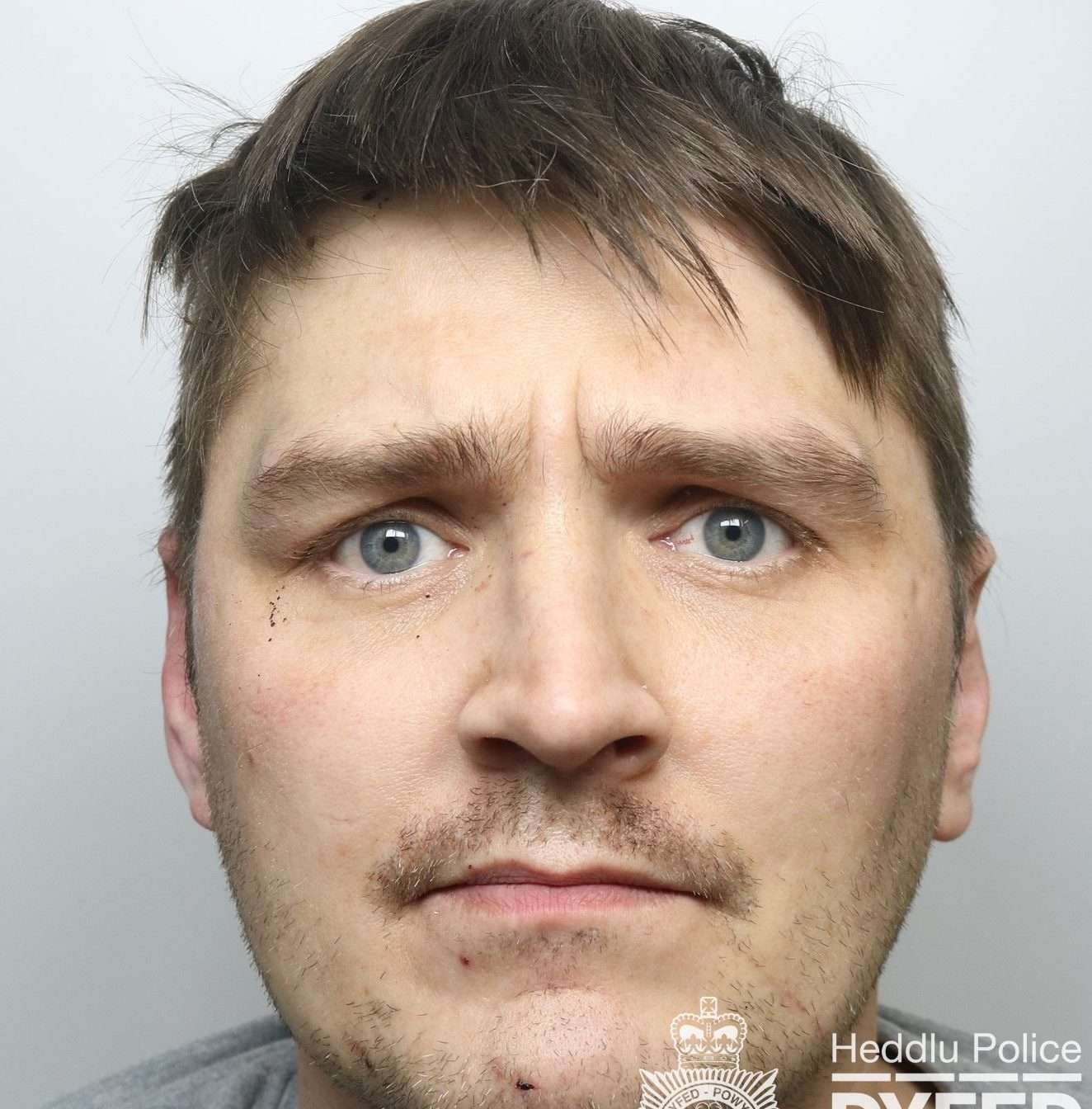 Man wanted for breach of court order and assault