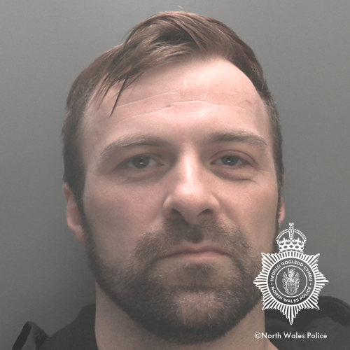 Persistent Holyhead offender jailed after assault on police